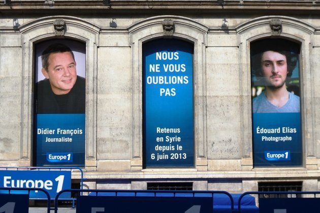 Les portraits de Didier François et d'Edouard Elias sur la façade d'Europe1